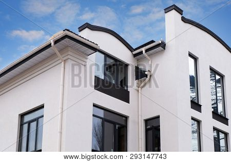 Irpin, Ukraine -december 29, 2017: Construction Of A New Modern House.newly Installed  Rain Gutter O
