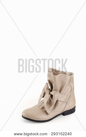 Beige Woman Long Boot Shoe Isolated On White Background. Fashionable Boots For Women May Exhibit All