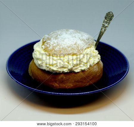 Traditional Bun In Some Parts Of World: Called Semla, Fastlagsbulle Or Vastlakukke, Icing Sugar On T