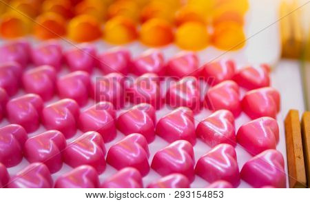 Pink Heart Shape Chocolate. Valentine's Day Gift. White Chocolate Ganache With Rose Scent On White P