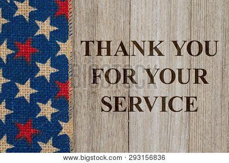 Thank You For Your Service  Text With Usa Red And Blue Stars Burlap Ribbon On Weathered Wood