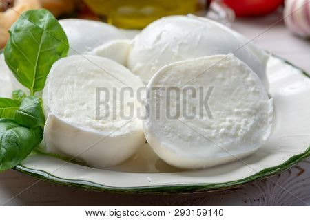 Balls And Pieces Of Buffalo Mozzarella, Soft Italian Scheese Made From The Milk Of Italian Mediterra
