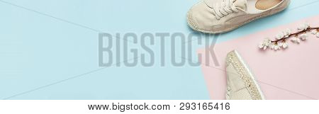 Beige Fashionable Women's Espadrilles With Spring Flowering Branch On Color Pastel Blue Pink Backgro