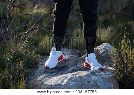 Cape Town, South Africa. 03 April 2019. A Pair Of White And Red Adidas Nmd Running Shoes.