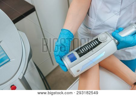 Cropped View Of Cosmetologist Doing Endospheres Therapy For Arm