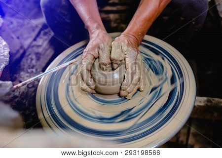 Pottery, Workshop, Ceramics Art Concept - Closeup On Male Hands Sculpt New Utensil With A Tools And