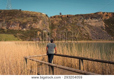 A Young Man Alone On A Lake, Portrait, La Arboleda, Basque Country