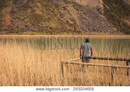 A Young Man Alone On A Lake, Portrait, La Arboleda, Basque Country