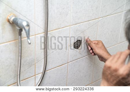 Plumber Cover The Broken Hole Pipline Inside By Covering It With Cement.