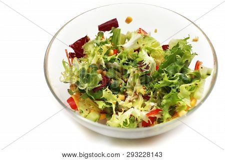 Fresh Salad In A Glass Bowl. Salad. Organic Food. Healthy Vegetable Salad With Escarole Endive, Fris