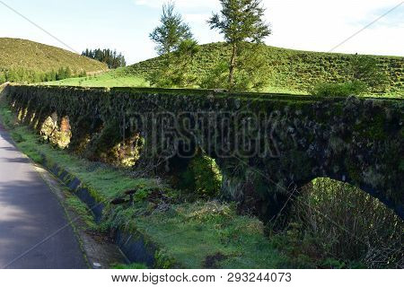 Aqueduct With Foliage On The Canario Trail On The Route To Sete Cidades In Sao Miguel.