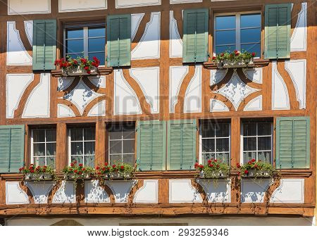 Bremgarten, Switzerland - June 16, 2018: Partial View Of The Facade Of A Building In The Historic Pa