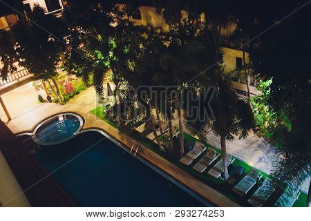 Phuket, Thailand - March. 2 2019 : Swimming Pool At Night On A Beautiful Resort.