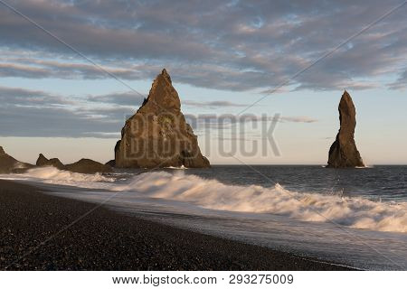 Reynisdrangar Are Basalt Sea Stacks Situated Under The Mountain Reynisfjall Near The Village Vik I M