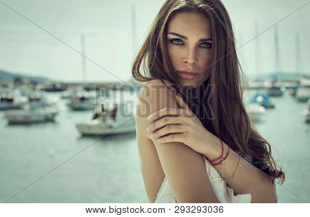 Portrait Of Brunette Woman With Long Hair
