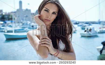 Delicate Young Brunette Woman With Long Hair