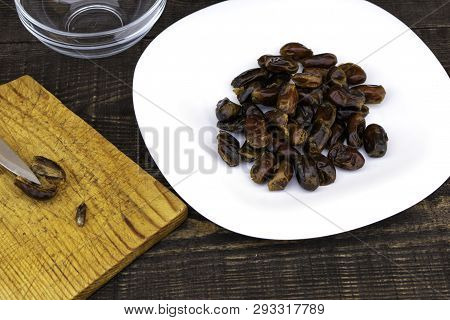 Hushaf - Date Milk, A Traditional Dish Of Ramadan, Cooking, Ingredients, Cut Pitted Dates, A Knife A