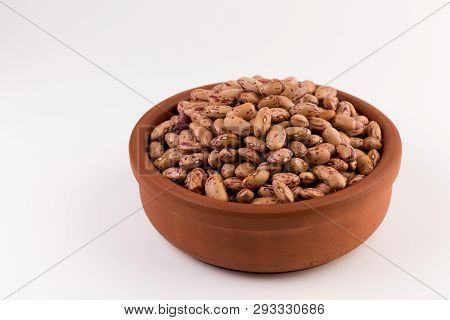 A Plate Of Beans On White Background