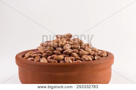 A Plate Of Beans On White Background