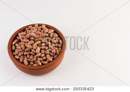 A Plate Of Beans On White Background