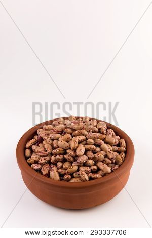 A Plate Of Beans On White Background