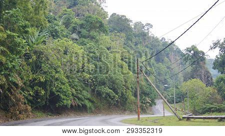 Kedah, Langkawi, Malaysia - Apr 09th, 2015: Spectacular Jungle Landscape With A Empty Street