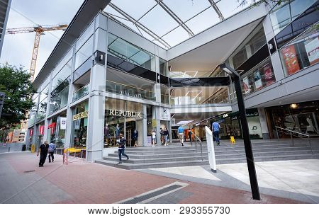 Johannesburg, South Africa, 22nd March- 2019: Entrance To Modern Mall With Pedestrians Walking.