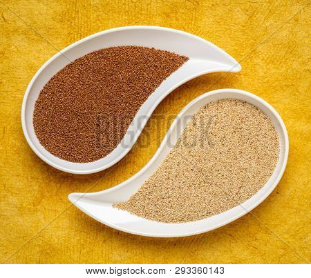 gluten free brown and ivory teff grain on teardrop shaped bowll against yellow textured paper - important food grain in Ethiopia and Eritrea