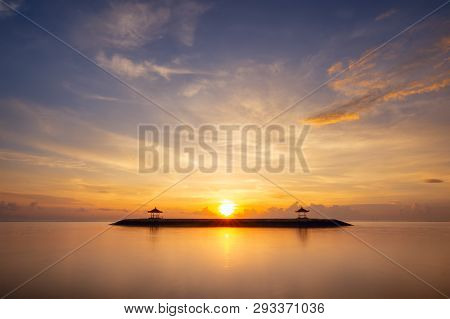 Sunrise On The Beach Sanur Bali With Famous Icon
