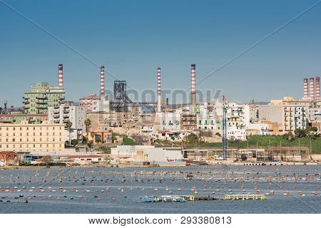 Panorama Of Steel Plant Industry On The Sea Side Very Close To The Old City Of Taranto, Puglia. Ital