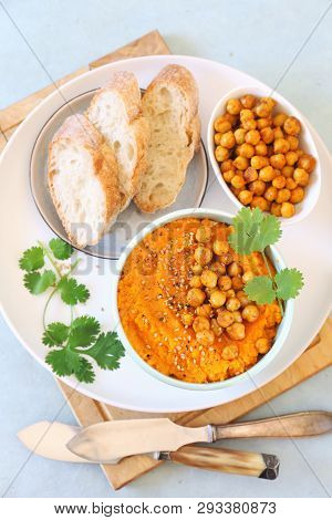 Vegetarian Appetizer. Carrot And Hummus Dip And Bread, Sesame And Chick-pea Dressing On Light Backgr