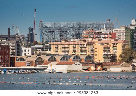 Panorama Of Steel Plant Industry On The Sea Side Very Close To The Old City Of Taranto, Puglia. Ital