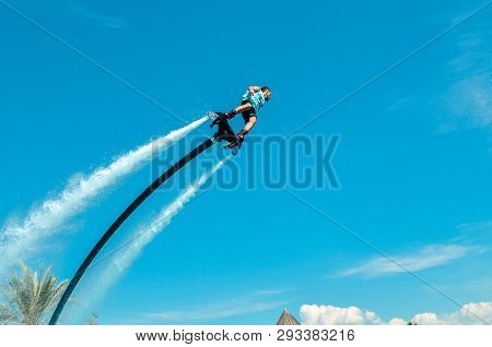 Belek, Turkey - September 12, 2018. Exciting Fly Board Watershow On A Sunny Summer Day. A Man Is Doi