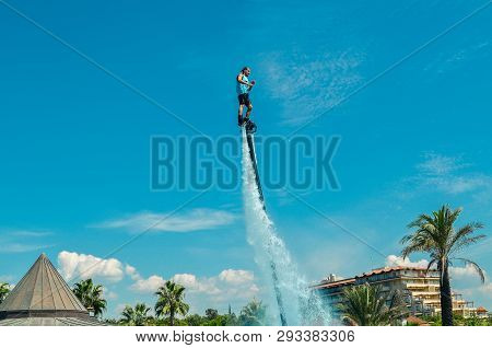 Belek, Turkey - September 12, 2018. Exciting Fly Board Watershow On A Sunny Summer Day. A Man Is Doi