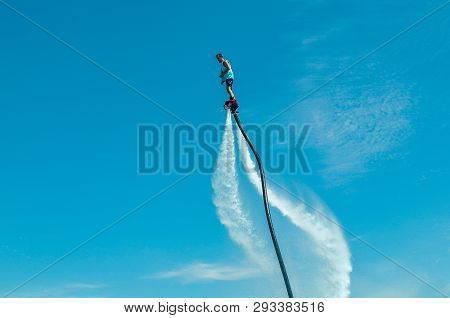 Belek, Turkey - September 12, 2018. Exciting Fly Board Watershow On A Sunny Summer Day. A Man Is Doi