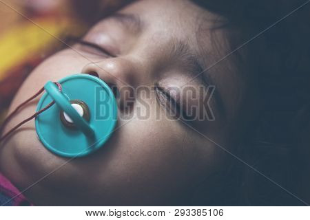 Closeup Of An Indian Toddler Baby Sleeping. Closeup Of An Asian Indian Infant Baby Sleeping