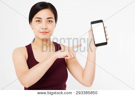 Cute Korean,asian Woman Finger Points At Blank Screen Phone Isolated On White Background