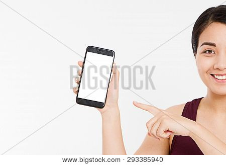 Cropped Portrait Asian,korean Woman,girl Hold Blank Screen Cellphone, Finger Pointing Isolated On Wh