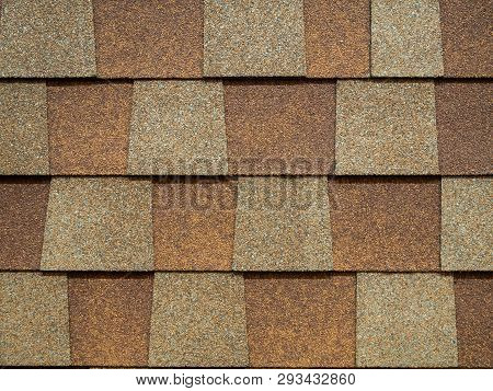 Closeup Of Modern Roof Trapezoid Square Shingles Tiles. Waterproof Scabrous Rough Surface For House 