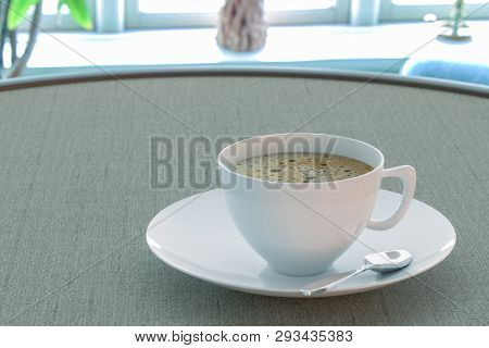 Coffee In A Cup On The Table By The Window. Coffee By The Window. Coffee Break. Morning Silence. Rom
