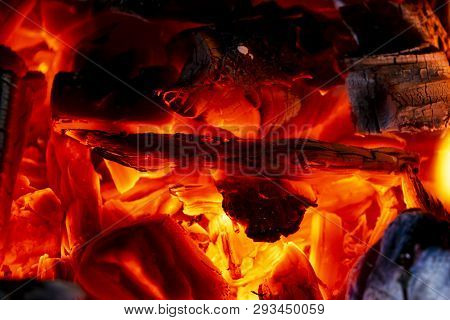 Burning Firewood In The Fireplace Close Up, Bbq Fire, Charcoal Background. Charcoal Fire With Sparks