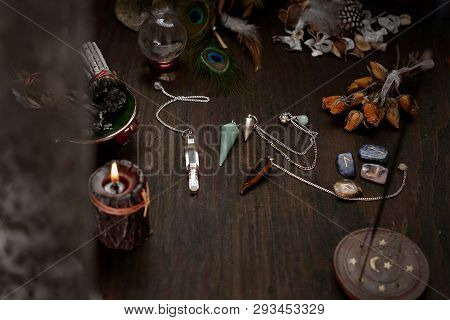 Faerie Accessories. A Deck Of Old Divination Cards And A Stone Pendulum.