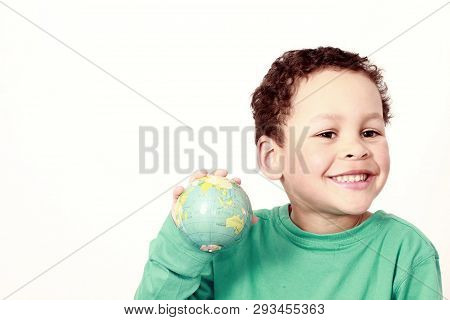 Little Boy With Globe In His Hand With White Background Stock Photo