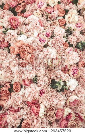Background Of Artificial Roses; All Shades Of Rose Colour.