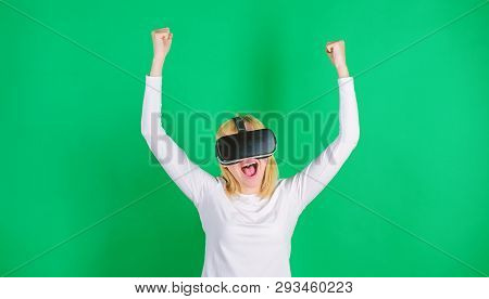 Confident Young Woman Adjusting Her Virtual Reality Headset And Smiling. Woman Using Vr Device. Augm