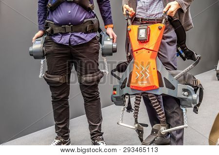 Hannover , Germany - April 02 2019 : German Bionic Presents First Robot Exoskeleton For The Industri
