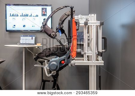 Hannover , Germany - April 02 2019 : German Bionic Presents First Robot Exoskeleton For The Industri