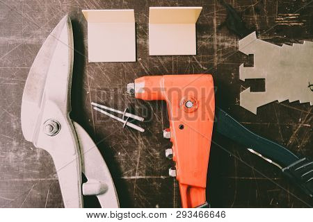 Tinsmith Tools On The Working Table In The Factory