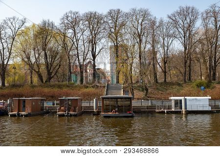 Bydgoszcz, Kujawsko-pomorskie / Poland - April, 4, 2019: Residential Houses By The River In Central