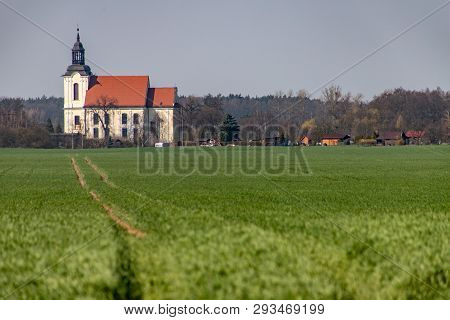 Zamarte, Kujawsko-pomorskie / Poland - April, 4, 2019: A Historic Church In The Countryside In Centr